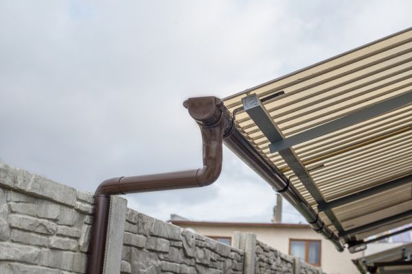 Plastic Downspout Installation in Shelby